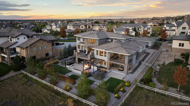 a front view of a residential apartment building with a yard