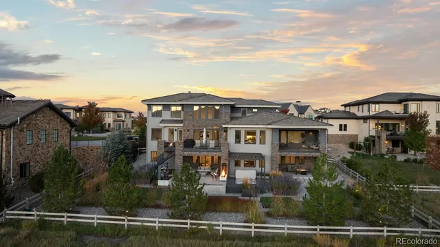 an aerial view of a house with swimming pool