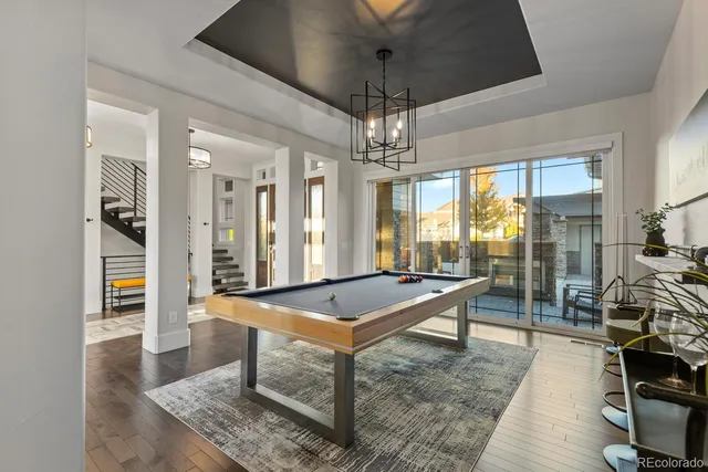 a living room with fireplace furniture and a flat screen tv