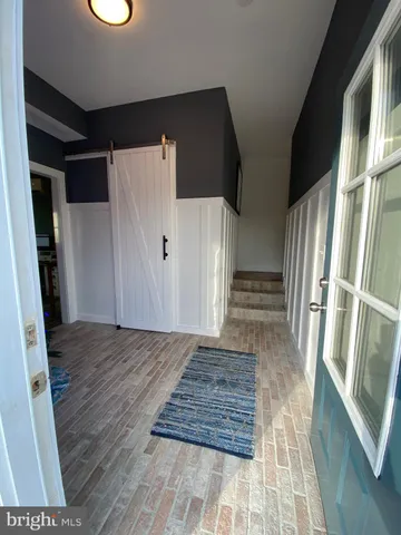a view of wooden floor in an empty room