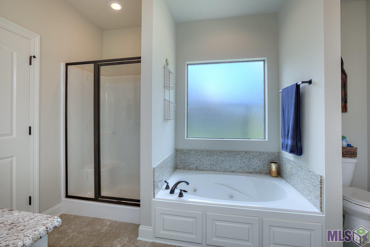 8231 Valencia Court Baton Rouge, LA 70820 - Photo 11 of 18 Separate Tub and Shower!