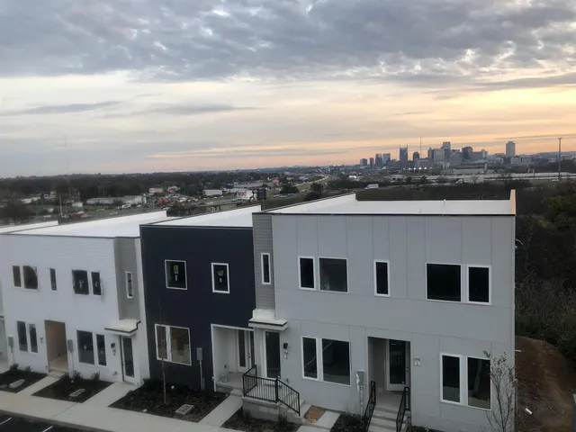 a view of city with tall buildings