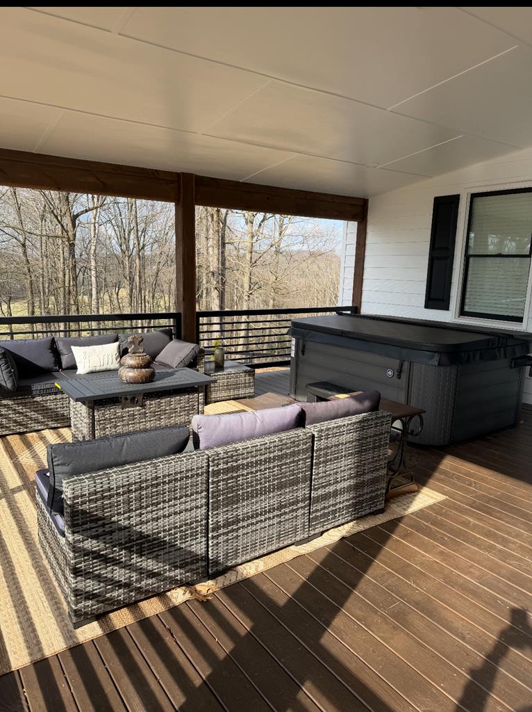 2086 Burnt Mountain Road Ellijay, GA 30536 - Photo 21 of 47 a living room with a large window