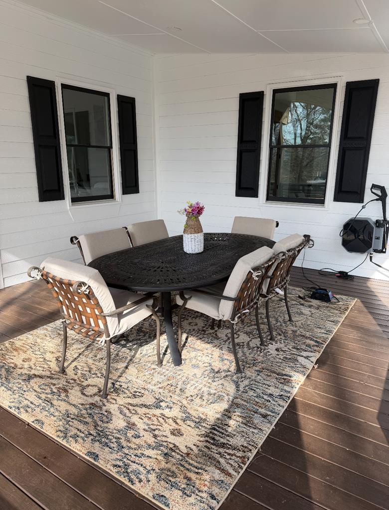 2086 Burnt Mountain Road Ellijay, GA 30536 - Photo 22 of 47 a view of a living room and dining room