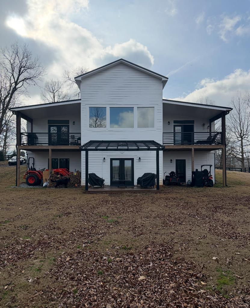 2086 Burnt Mountain Road Ellijay, GA 30536 - Photo 4 of 47 a view of a house with a sink and yard