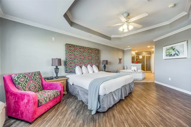 a bedroom with bed and window