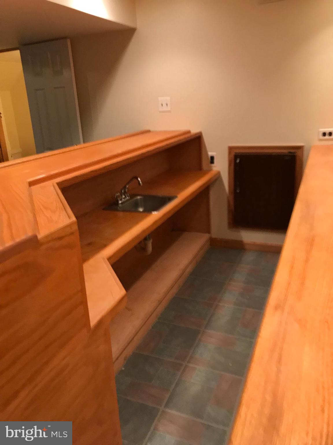 567 Nancy Road Yardley, PA 19067 - Photo 24 of 34 Wet bar with mini refrigerator