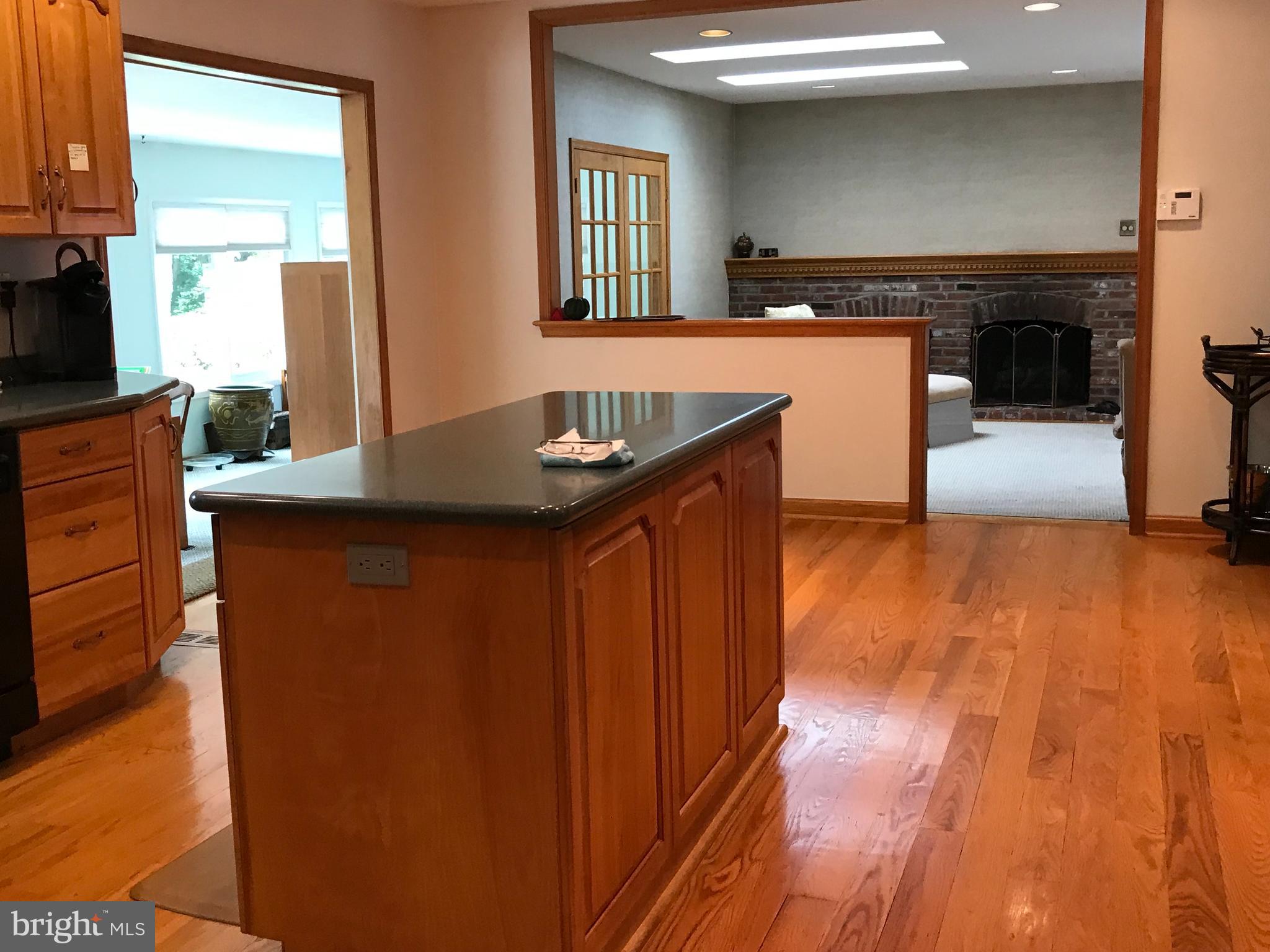 Kitchen with view of Family rm & Sun rm