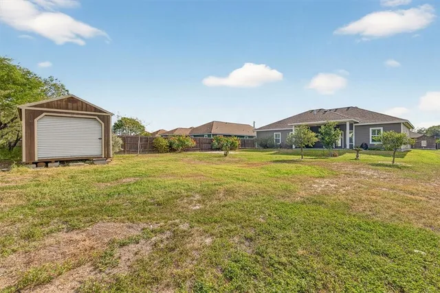 a view of an ocean outdoor space and swimming pool
