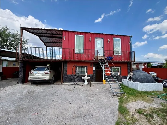 a car parked in front of a building