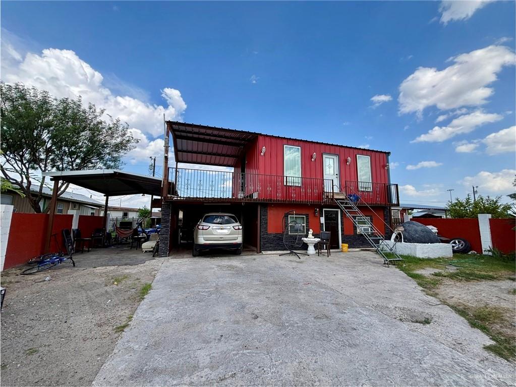 7408 Mackenzie Street Donna, TX 78537 - Photo 15 of 15 a view of a car park in front of house
