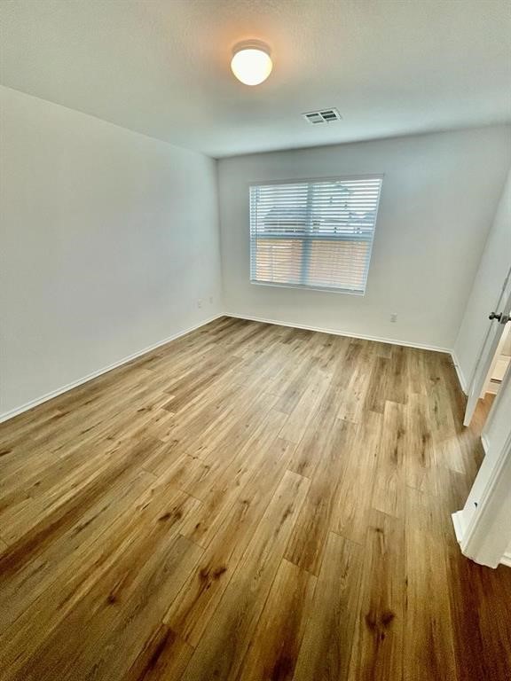 420 Perfect World Loop Jarrell, TX 76537 - Photo 10 of 17 wooden floor in an empty room