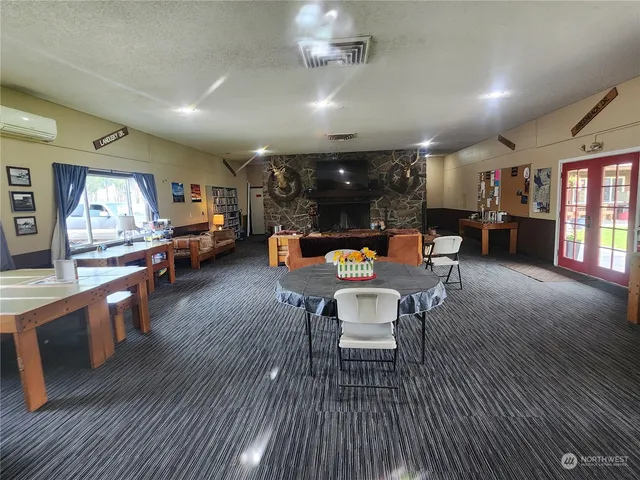 a kitchen with stainless steel appliances granite countertop a sink and cabinets