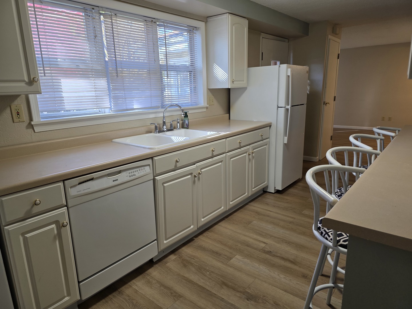 311 Maple Street Prophetstown, IL 61277 - Photo 6 of 9 a kitchen with a sink cabinets and window