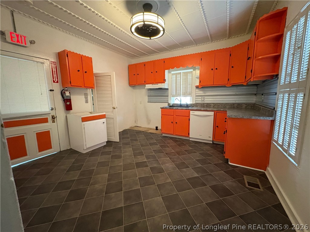 3174 Lindsay Road Raeford, NC 28376 - Photo 20 of 28 a kitchen with stainless steel appliances granite countertop a sink and a cabinets