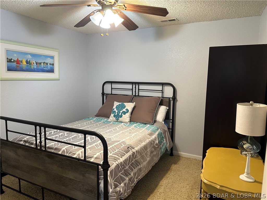 803 Winn Road, Unit 7C Osage Beach, MO 65065 - Photo 10 of 22 Guest Bedroom