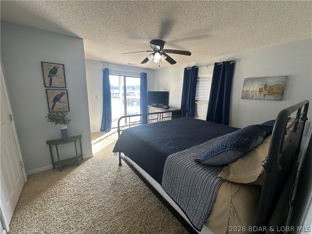 803 Winn Road, Unit 7C Osage Beach, MO 65065 - Photo 7 of 22 Primary Bedroom