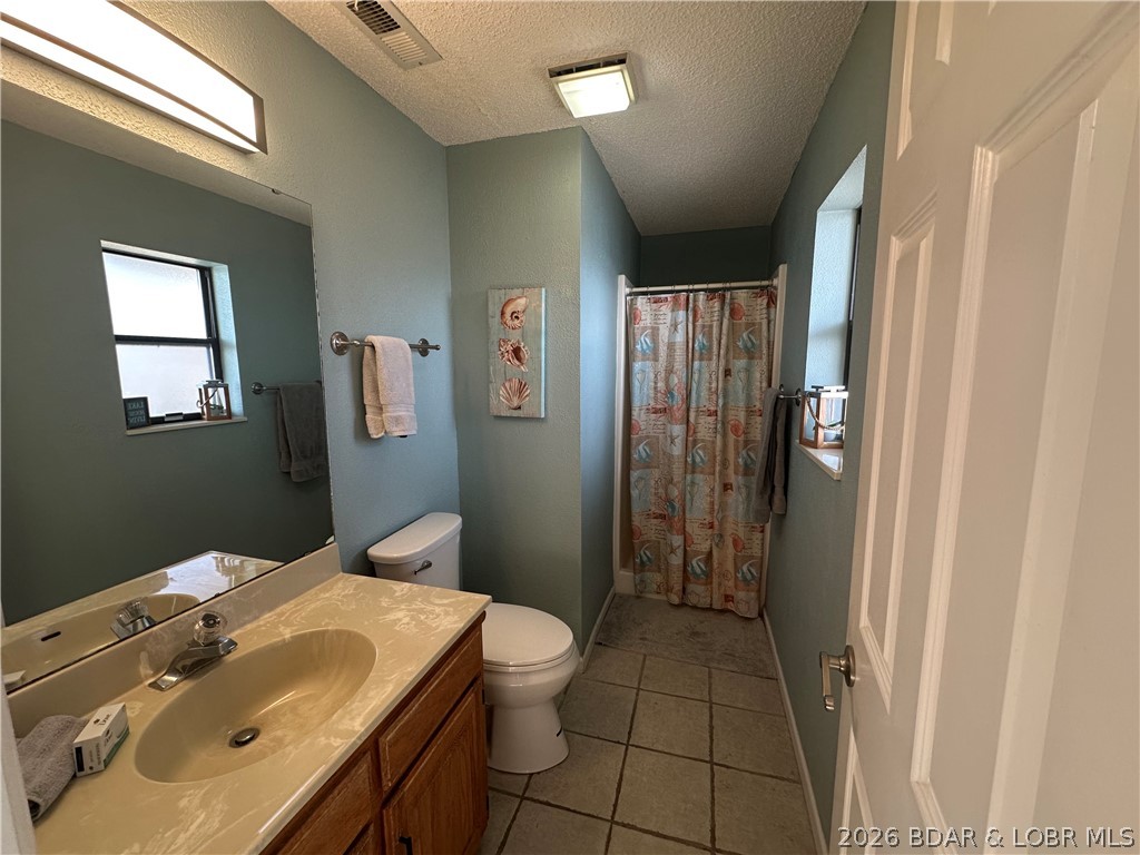 803 Winn Road, Unit 7C Osage Beach, MO 65065 - Photo 9 of 22 Primary Bath