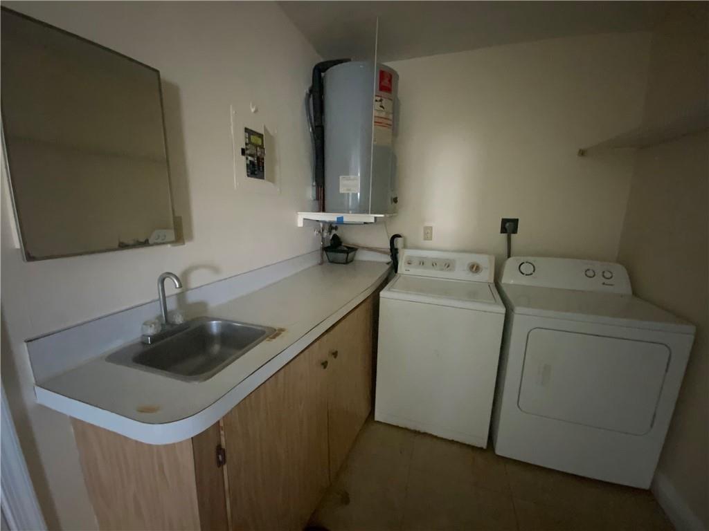 7104 Northwest 70th Street Tamarac, FL 33321 - Photo 25 of 30 a bathroom with a sink and a toilet