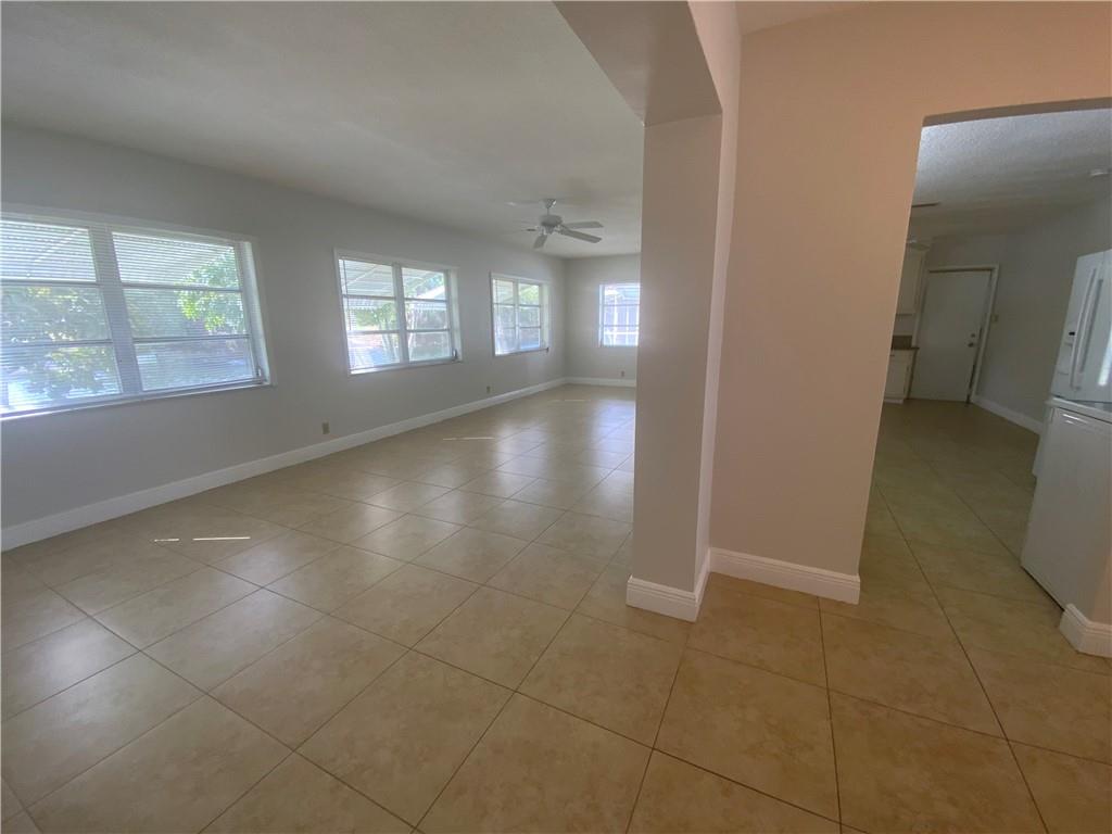 7104 Northwest 70th Street Tamarac, FL 33321 - Photo 9 of 30 a view of an empty room with a window