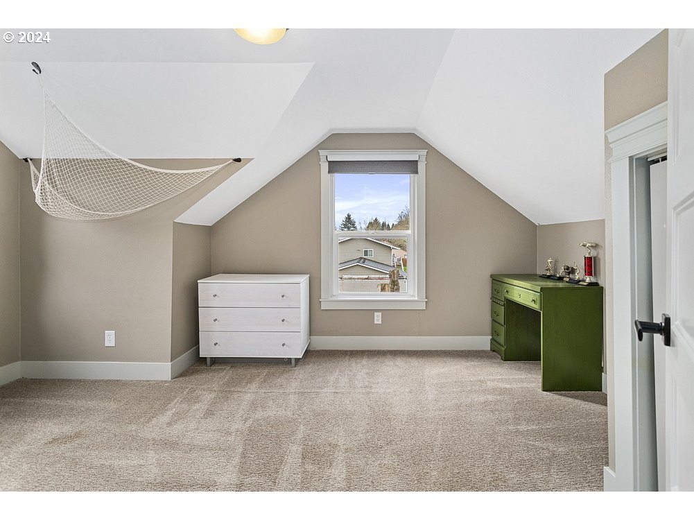 5360 Southeast Chase Road Gresham, OR 97080 - Photo 16 of 48 a view of a livingroom with furniture and a window