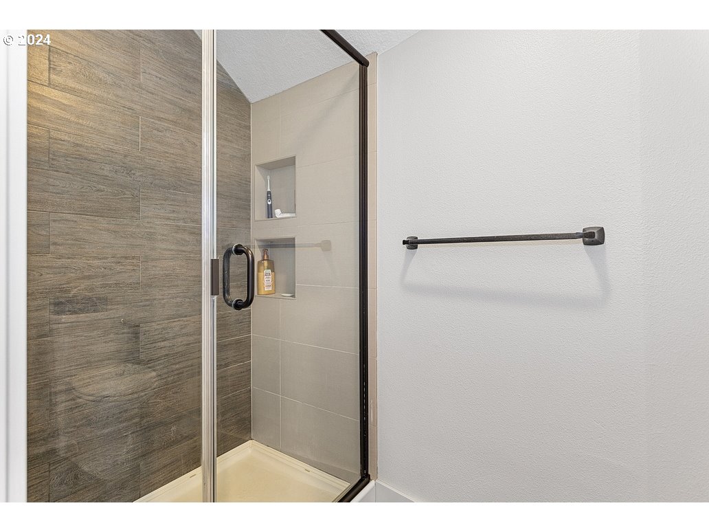 5360 Southeast Chase Road Gresham, OR 97080 - Photo 29 of 48 a bathroom with a shower