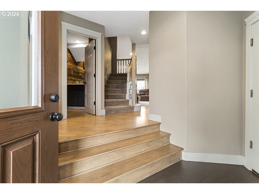 5360 Southeast Chase Road Gresham, OR 97080 - Photo 3 of 48 a view of entryway and hall with wooden floor