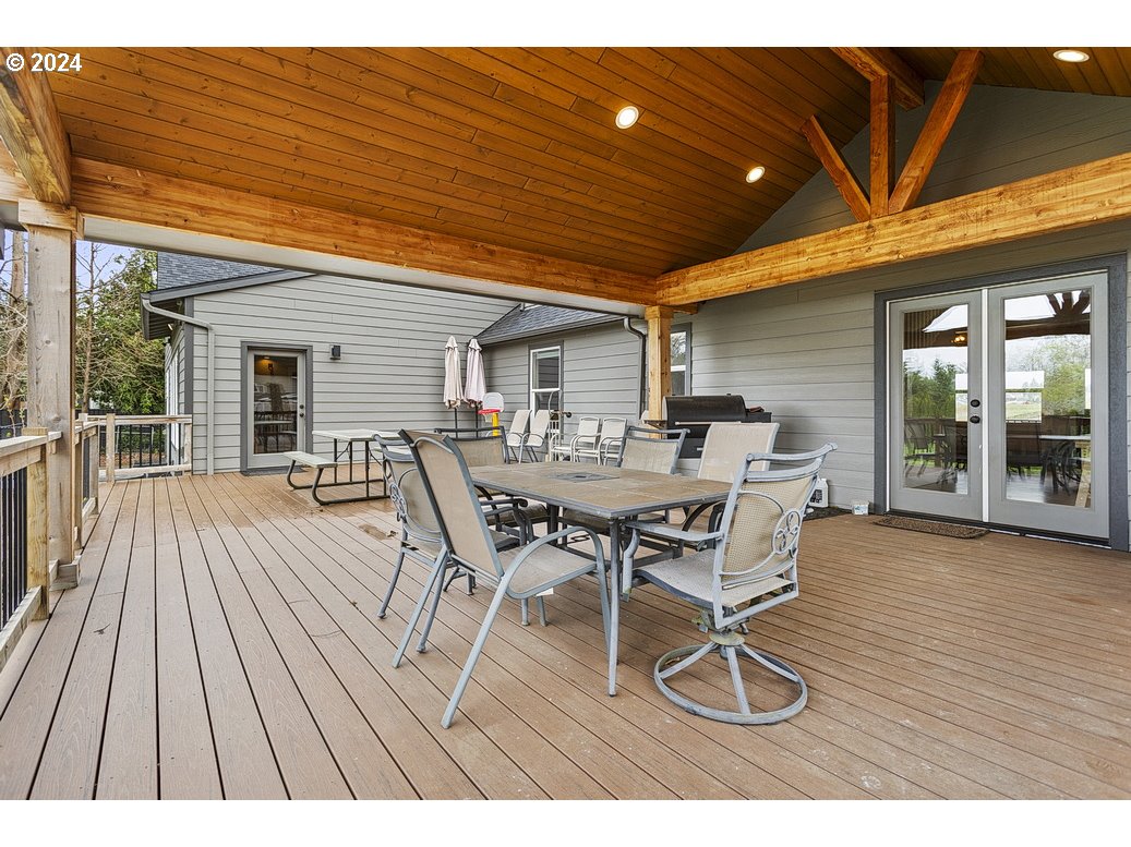 5360 Southeast Chase Road Gresham, OR 97080 - Photo 42 of 48 a patio with table and chairs