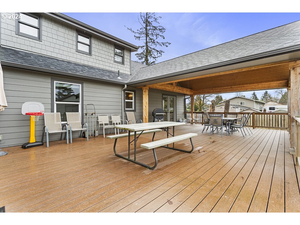 5360 Southeast Chase Road Gresham, OR 97080 - Photo 43 of 48 a view of pool with lawn chairs and wooden floor