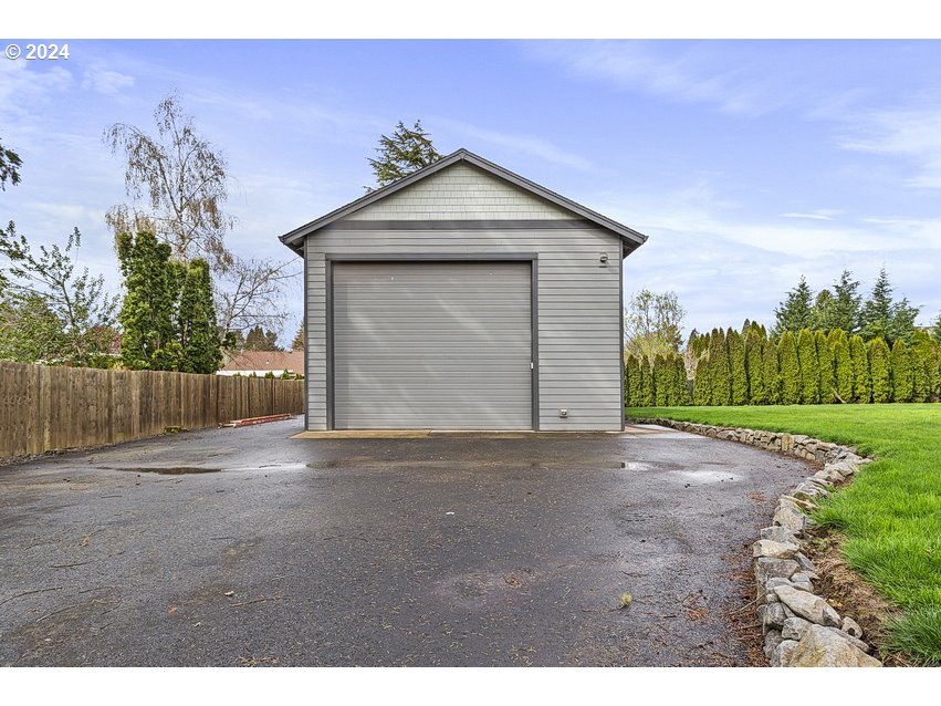 5360 Southeast Chase Road Gresham, OR 97080 - Photo 47 of 48 a view of backyard of house with green space