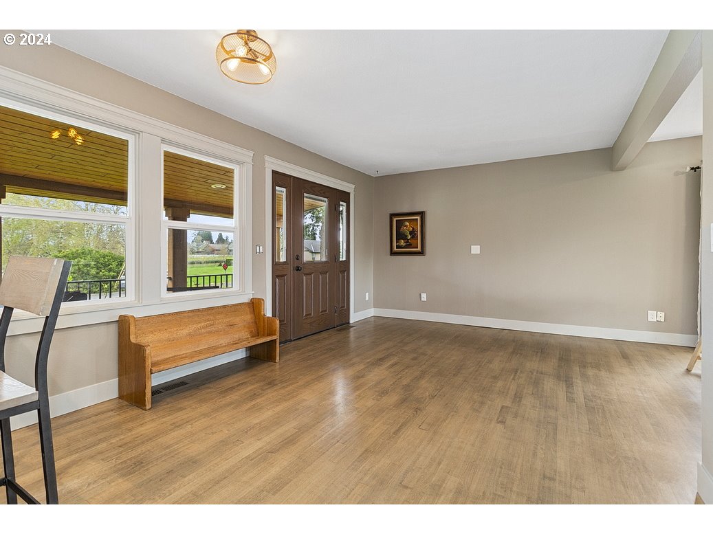 5360 Southeast Chase Road Gresham, OR 97080 - Photo 6 of 48 a view of an empty room with a window