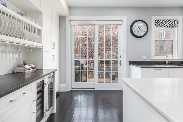 a view of a kitchen with a sink cabinets and a window