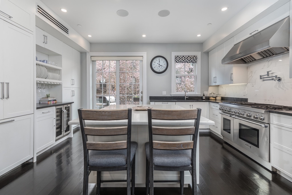 95 Appleton Street, Unit 2 Boston, MA 02116 - Photo 5 of 32 a kitchen with a stove a sink and a refrigerator
