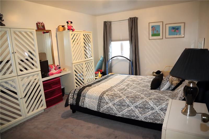 2240 Beulah Road Pittsburgh, PA 15235 - Photo 11 of 24 2nd bedroom is a great size and shares bath with 3rd bedroom.