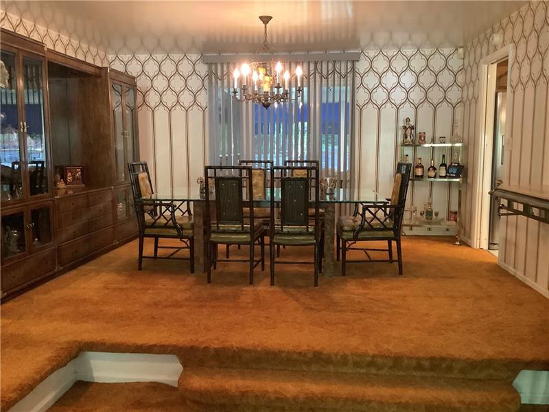2240 Beulah Road Pittsburgh, PA 15235 - Photo 3 of 24 The beautiful dining room, situated slightly above the living room, is the real focal point of this open area. There are HARD WOOD FLOORS under the carpeting.