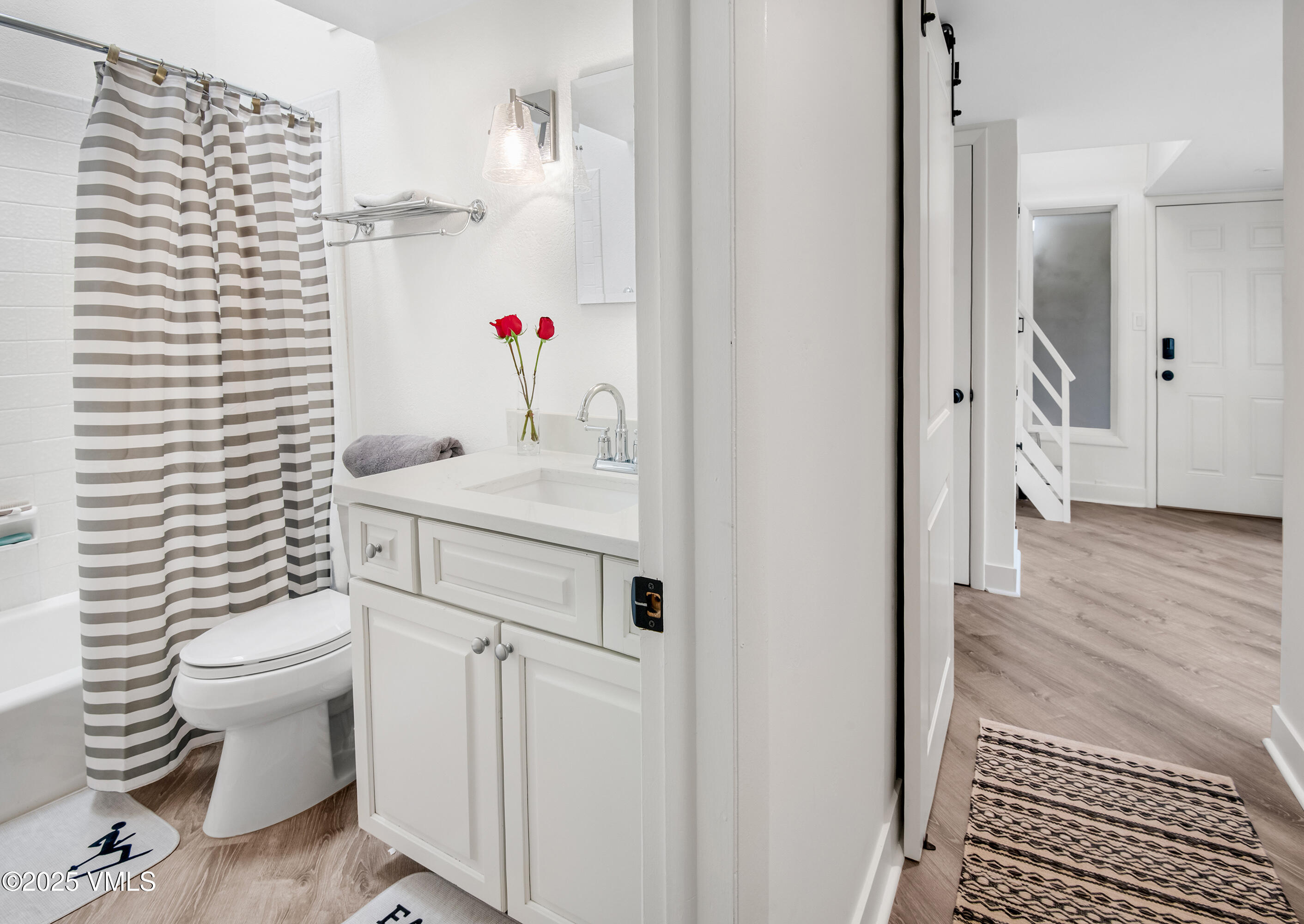 4480 Timber Falls Court, Unit 1507 Vail, CO 81657 - Photo 15 of 29 a bathroom with a sink toilet and shower