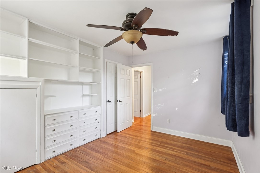 1151 Croyden Road Lyndhurst, OH 44124 - Photo 21 of 37 bedroom featuring light wood finished floors and a ceiling fan