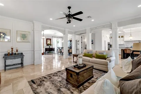 a kitchen with stainless steel appliances granite countertop a stove and a refrigerator