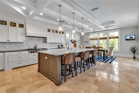 a utility room with sink dryer and washer