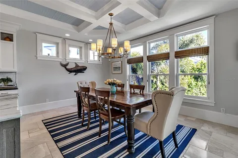 a building outdoor space with patio furniture and potted plants