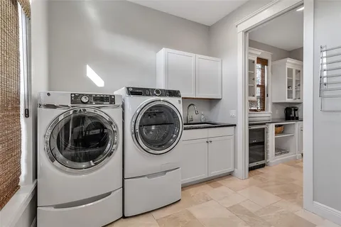 a bedroom with a bed wooden floor and window