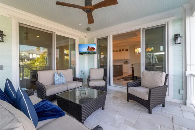 a view of kitchen with wooden floor and electronic appliances