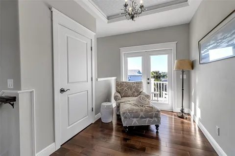 a view of a house with wooden deck