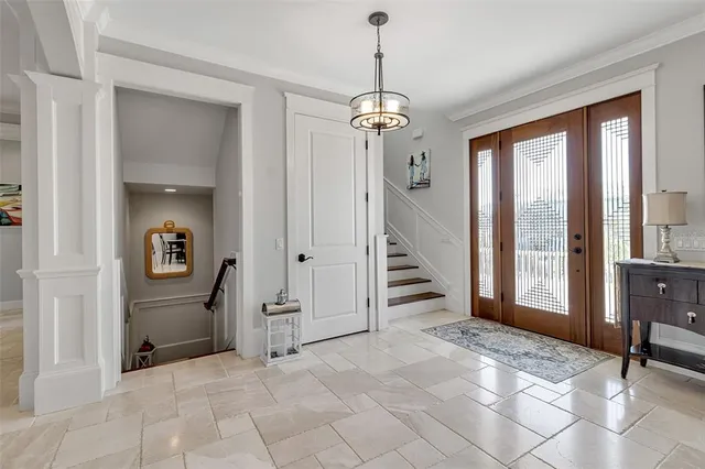 a large kitchen with lots of table and chairs