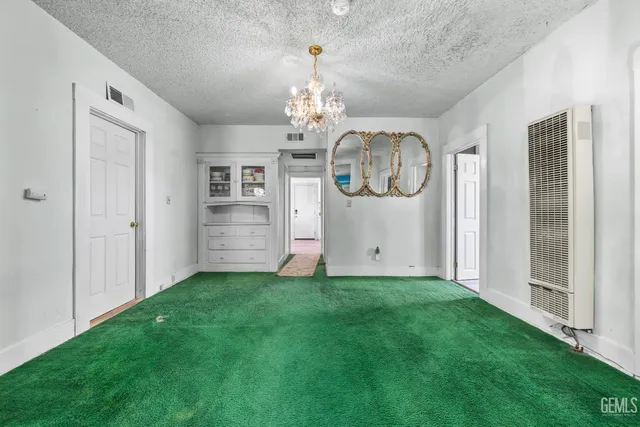 a view of entryway with kitchen