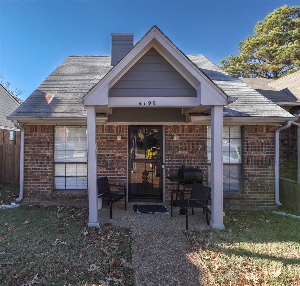 a front view of a house with a porch