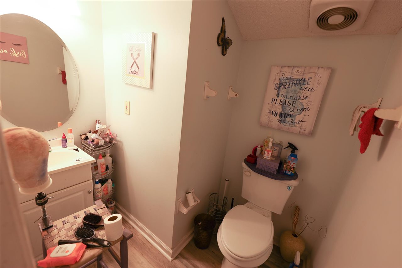 4199 Cedartree Drive Memphis, TN 38141 - Photo 11 of 12 a bathroom with a toilet and a shower curtain