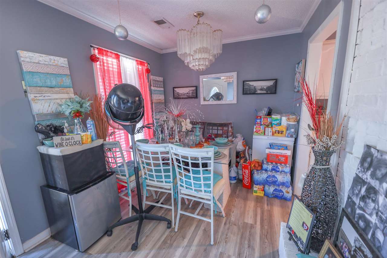 4199 Cedartree Drive Memphis, TN 38141 - Photo 3 of 12 a dining room with furniture and wooden floor