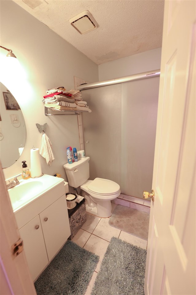 4199 Cedartree Drive Memphis, TN 38141 - Photo 5 of 12 a bathroom with a sink a toilet and shower