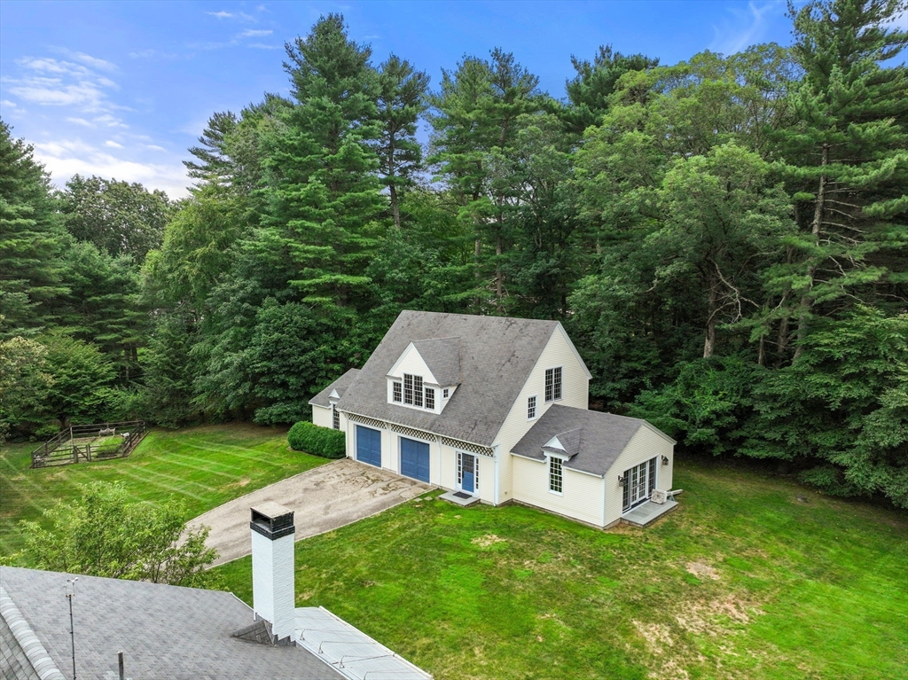 4 Claybrook Road Dover, MA 02030 - Photo 29 of 42 a front view of a house with garden